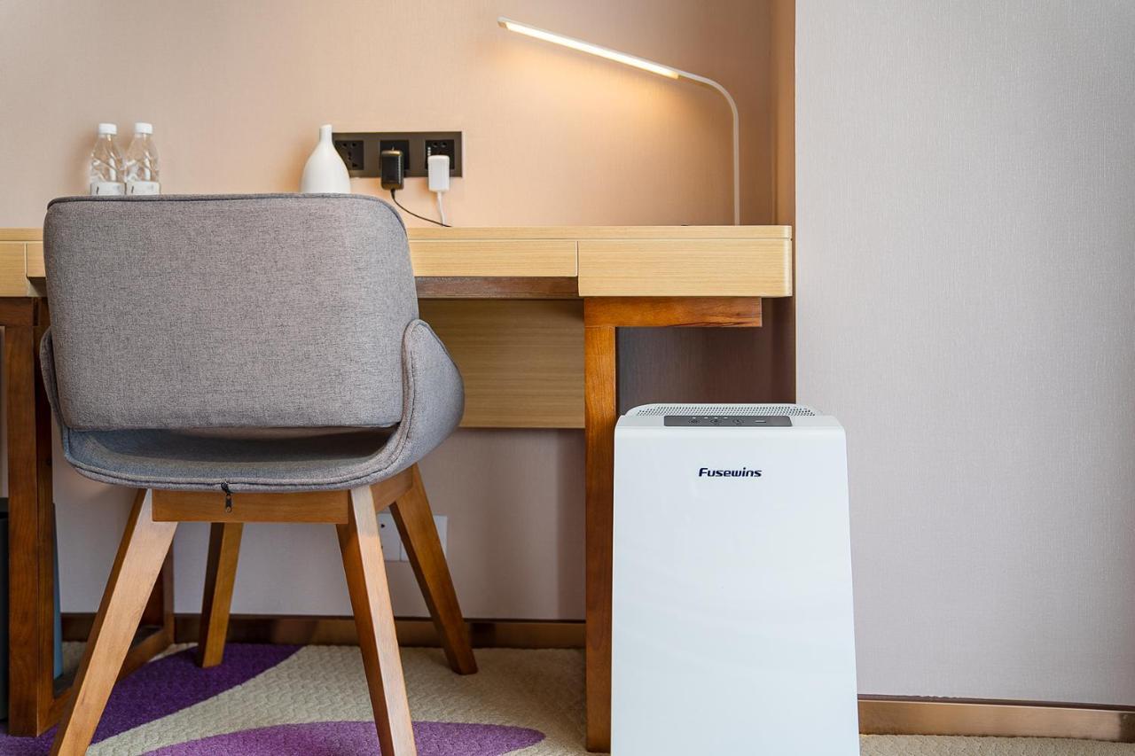 Echarm International Hotel Guangzhou Baiyun International Airport Huadu Plaza Branch - Free Deliver Service To Guangzhou Baiyun International Airport & Free Deliver Service To Canton Fair Complex During Canton Fair Period المظهر الخارجي الصورة